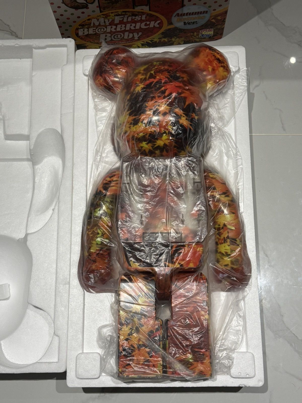 Medicom Toy Bearbrick My First Bearbrick Baby Autumn Leaves 1000% Size ONE SIZE - 3 Thumbnail