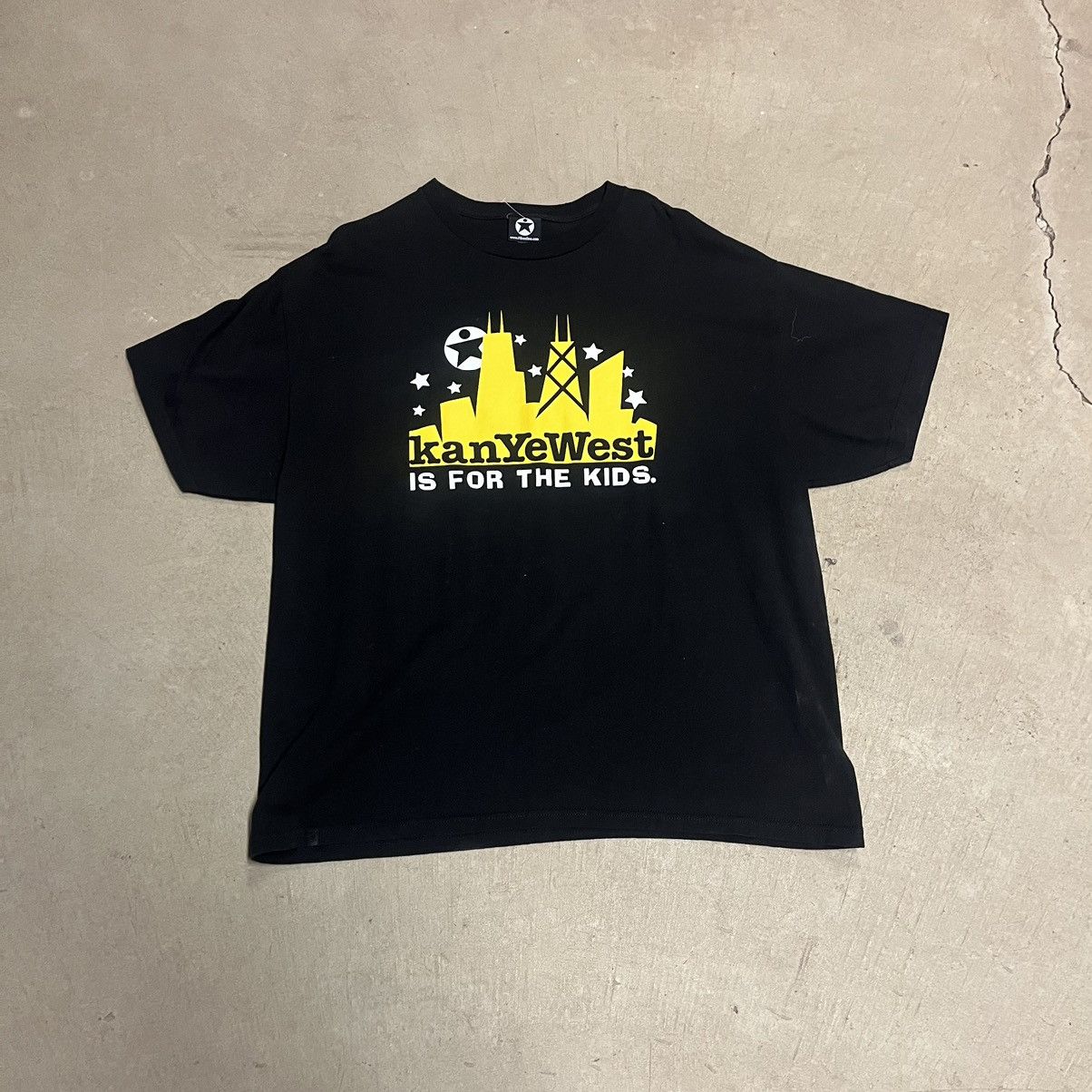 image of Archival Clothing x Kanye West Vintage 2004 Kanye West Is For The Kids Rap T Shirt in Black (Size 2