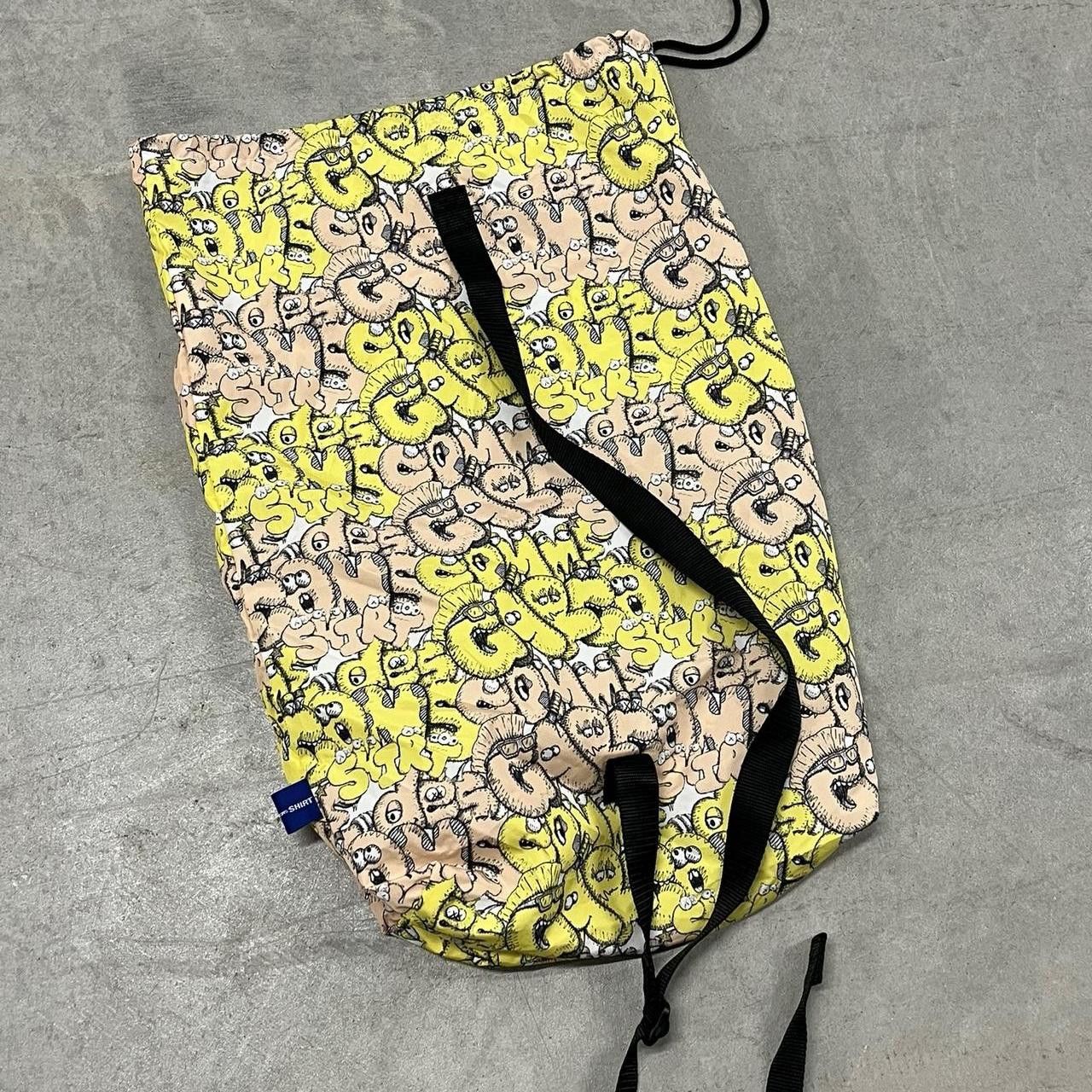 Comme des Garcons SHIRT × Kaws Cdg X Kaws Jawstring Bag Size ONE SIZE - 1 Thumbnail