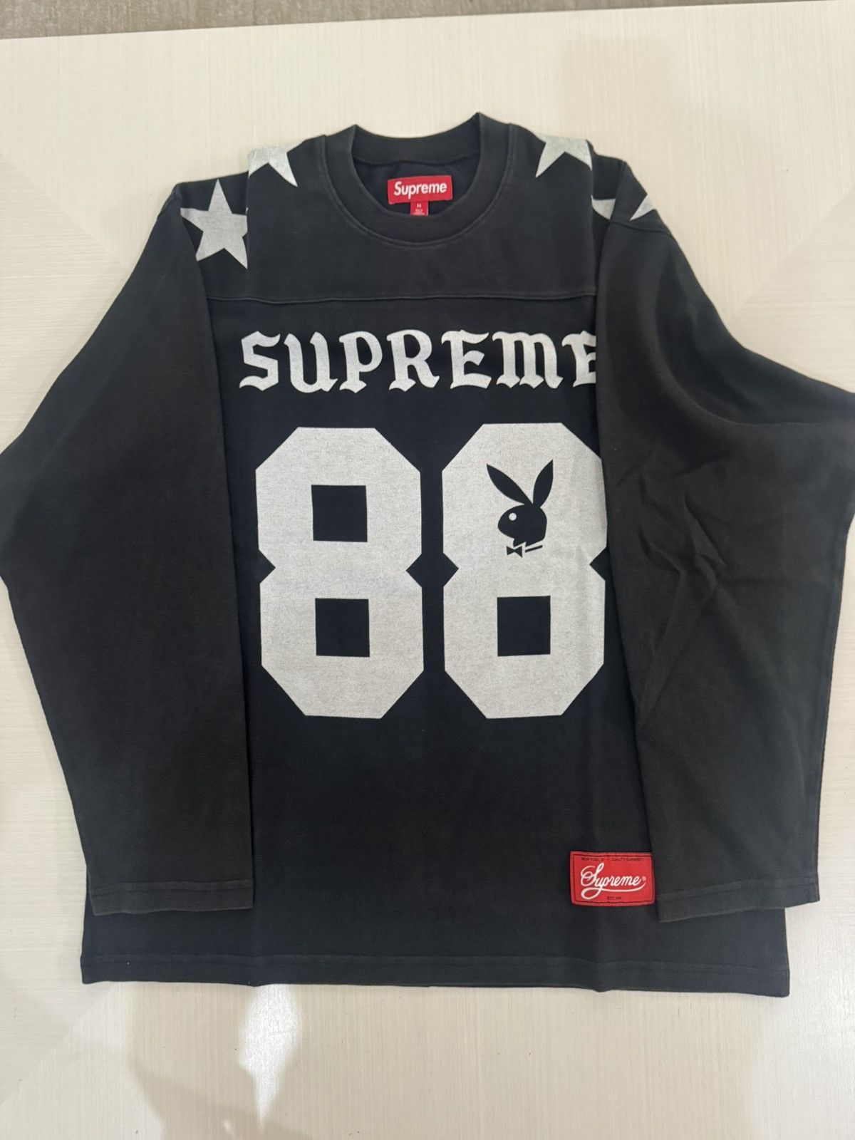 Supreme Supreme playboy L/S football top black Sz M SS26 NEW IN 