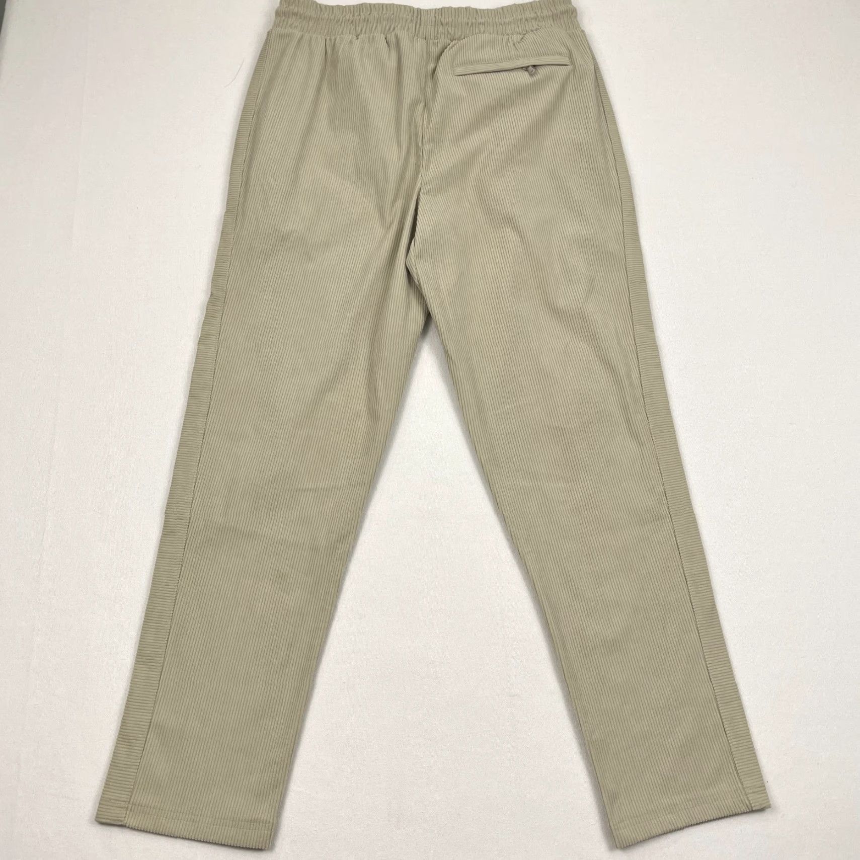 Fabletics Fabletics Mens Pants Cord Club Beig 30" L x 30" Soft Corduroy Athleisure New Regular Tapered Pockets Elastic Waist 100% Polyester Size US 33 - 7 Thumbnail