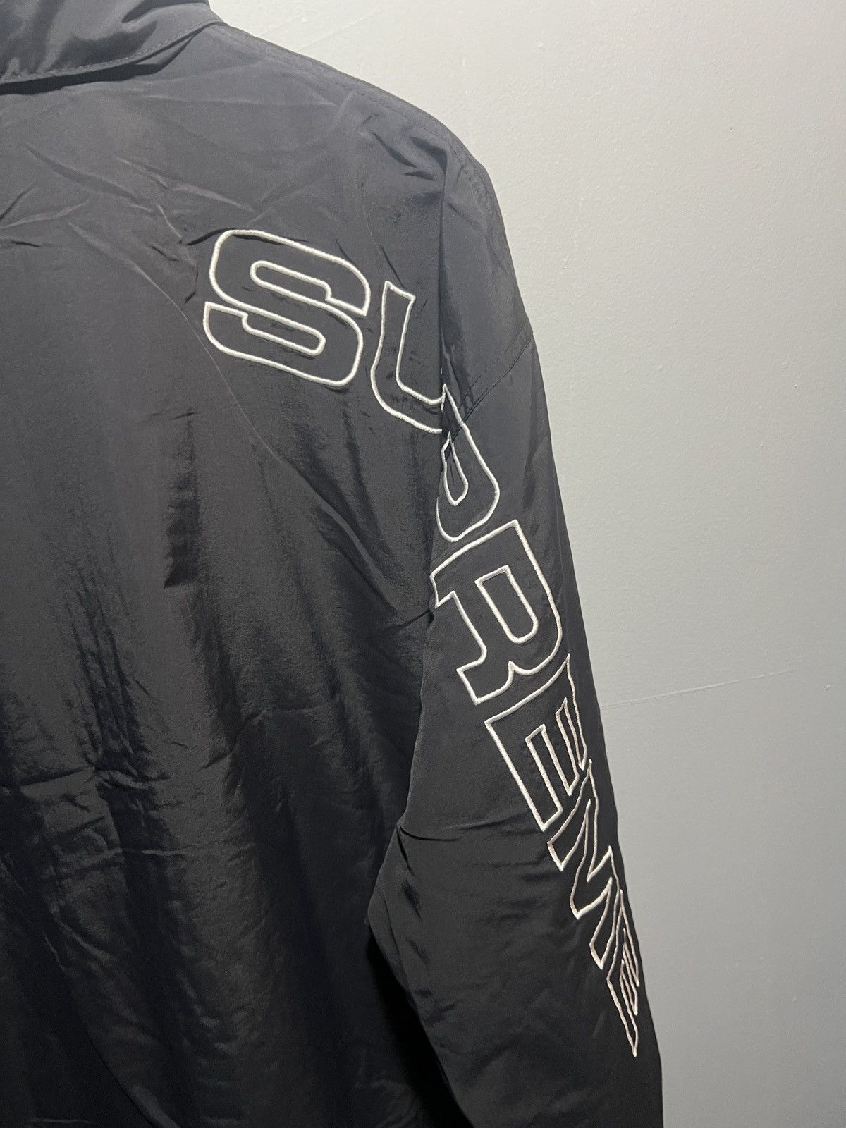 Supreme SUPREME EMBROIDERED SPELLOUT TRACK JACKET | Grailed