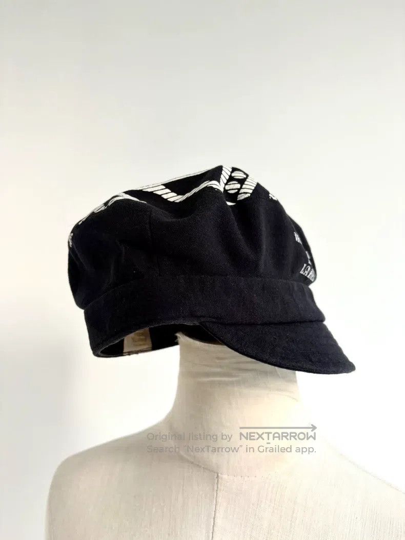 Vivienne Westwood Large Saturn Newsboy Hat