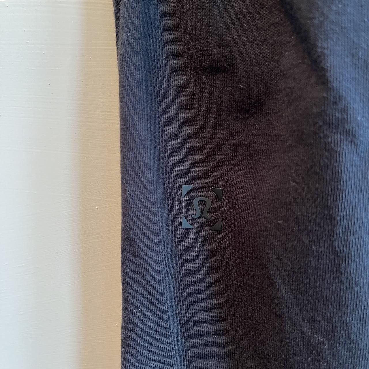 black lululemon 5 year basic T *LNY — gold logo decal
