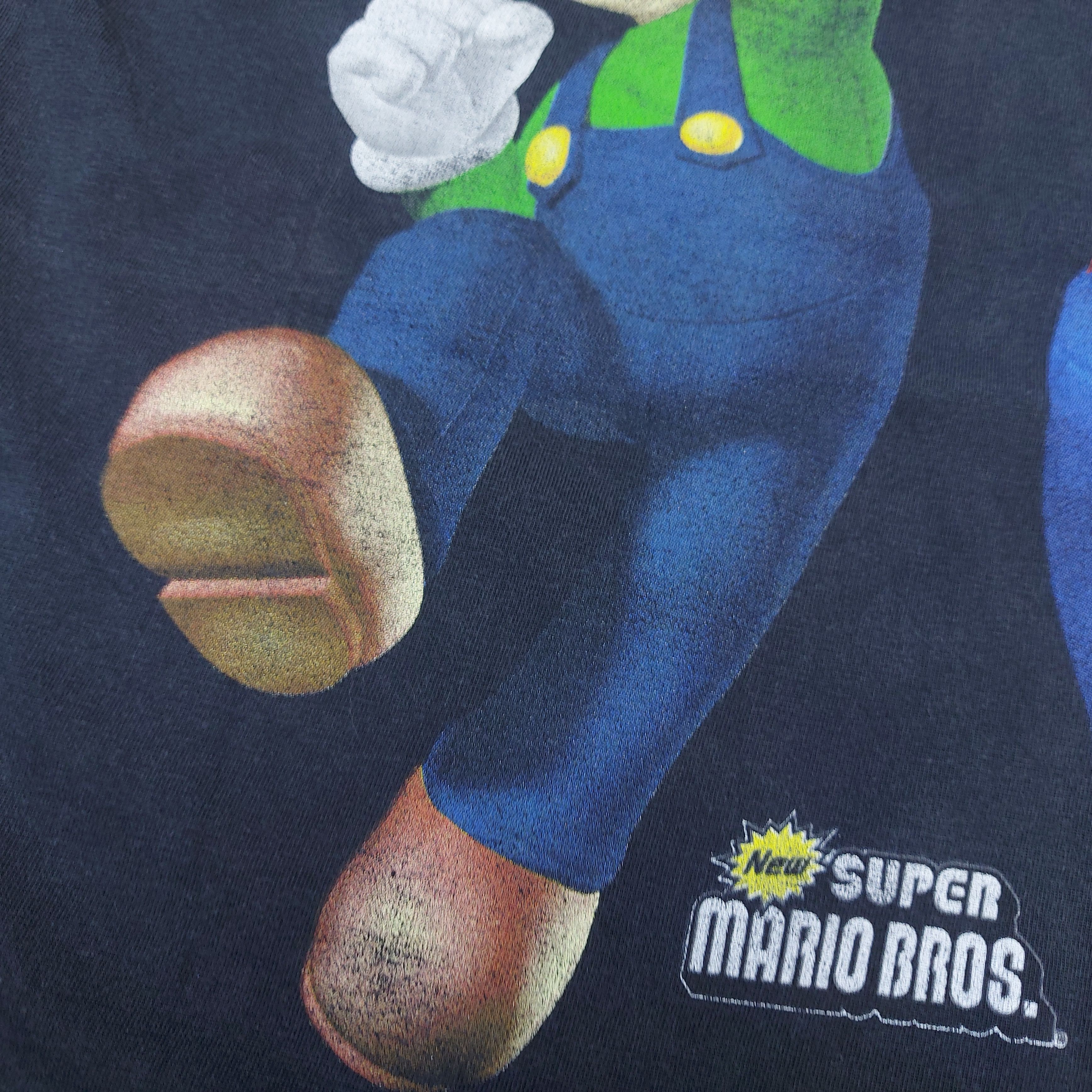 Nintendo Vintage 2006 Nintendo DS New Super Mario Bros Game Promo TEE Size US L / EU 52-54 / 3 - 5 Thumbnail