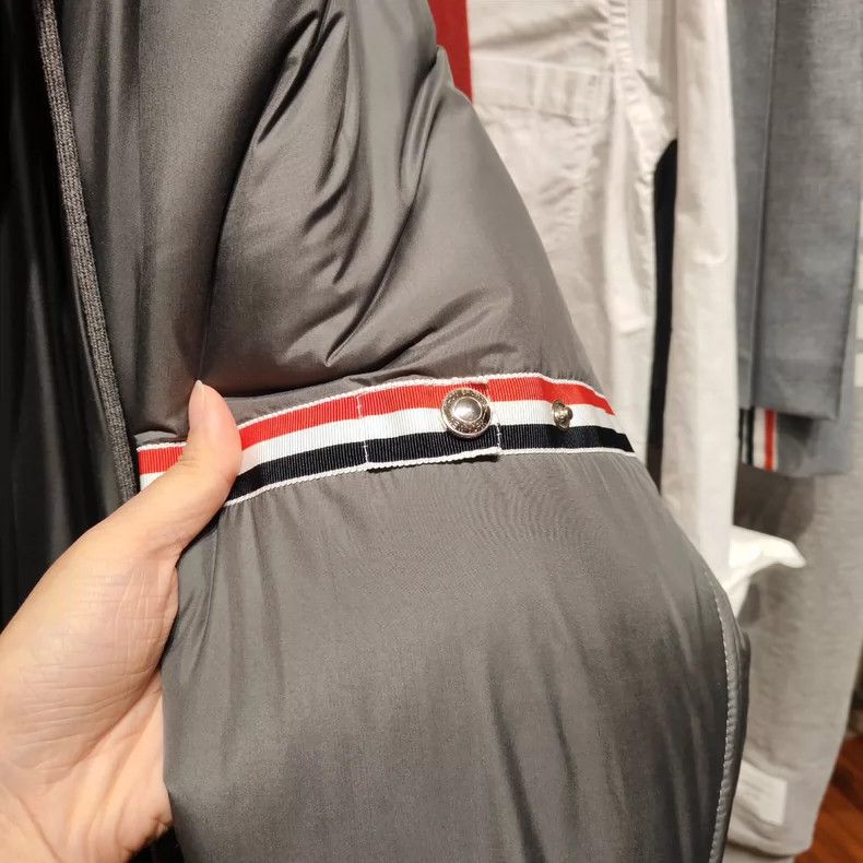 Thom Browne A striped down jacket with a hat