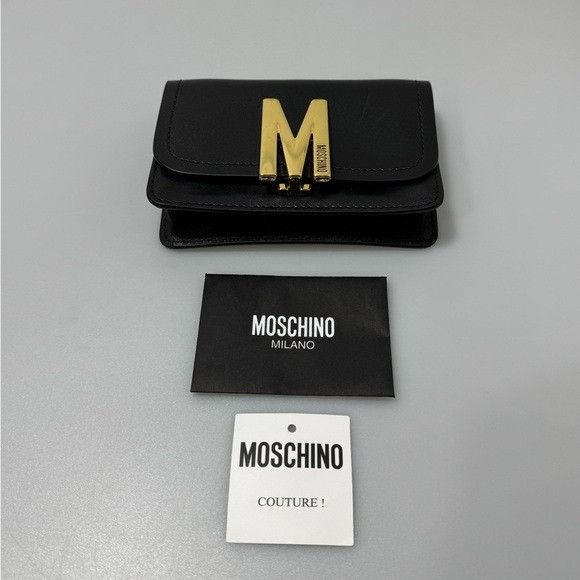 Moschino Moschino Logo-Plaque Leather Clutch Bag Black Gold Size ONE SIZE - 1 Thumbnail