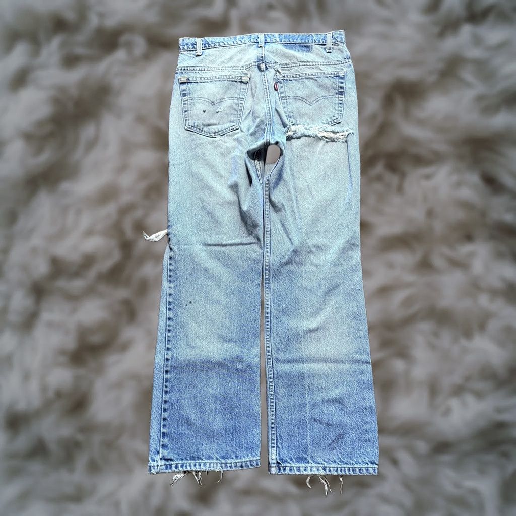 Levi's VINTAGE Levi's 517 Denim Jeans USA Bootcut Light Wash Distressed Thrashed 35x31 Size US 35 - 1 Thumbnail