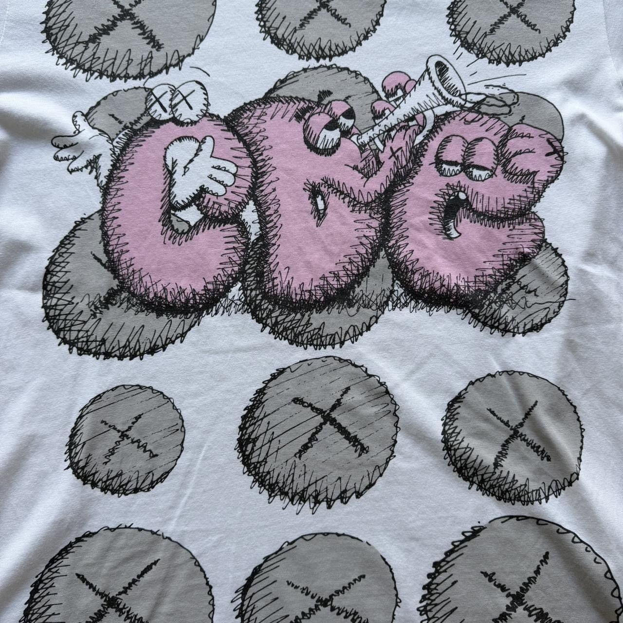 Comme des Garcons SHIRT × Kaws Comme des Garçon x Kaws 44T-Shirt White/Pink/Grey Size US M / EU 48-50 / 2 - 3 Thumbnail