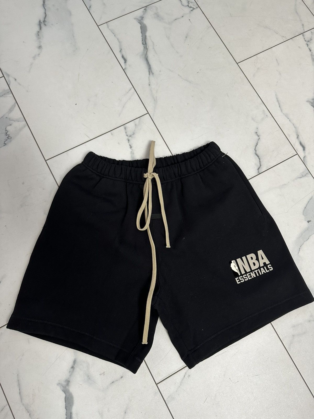 Essentials × NBA Essentials X NBA Shorts ‘Black’ Size US 30 / EU 46 - 1 Thumbnail