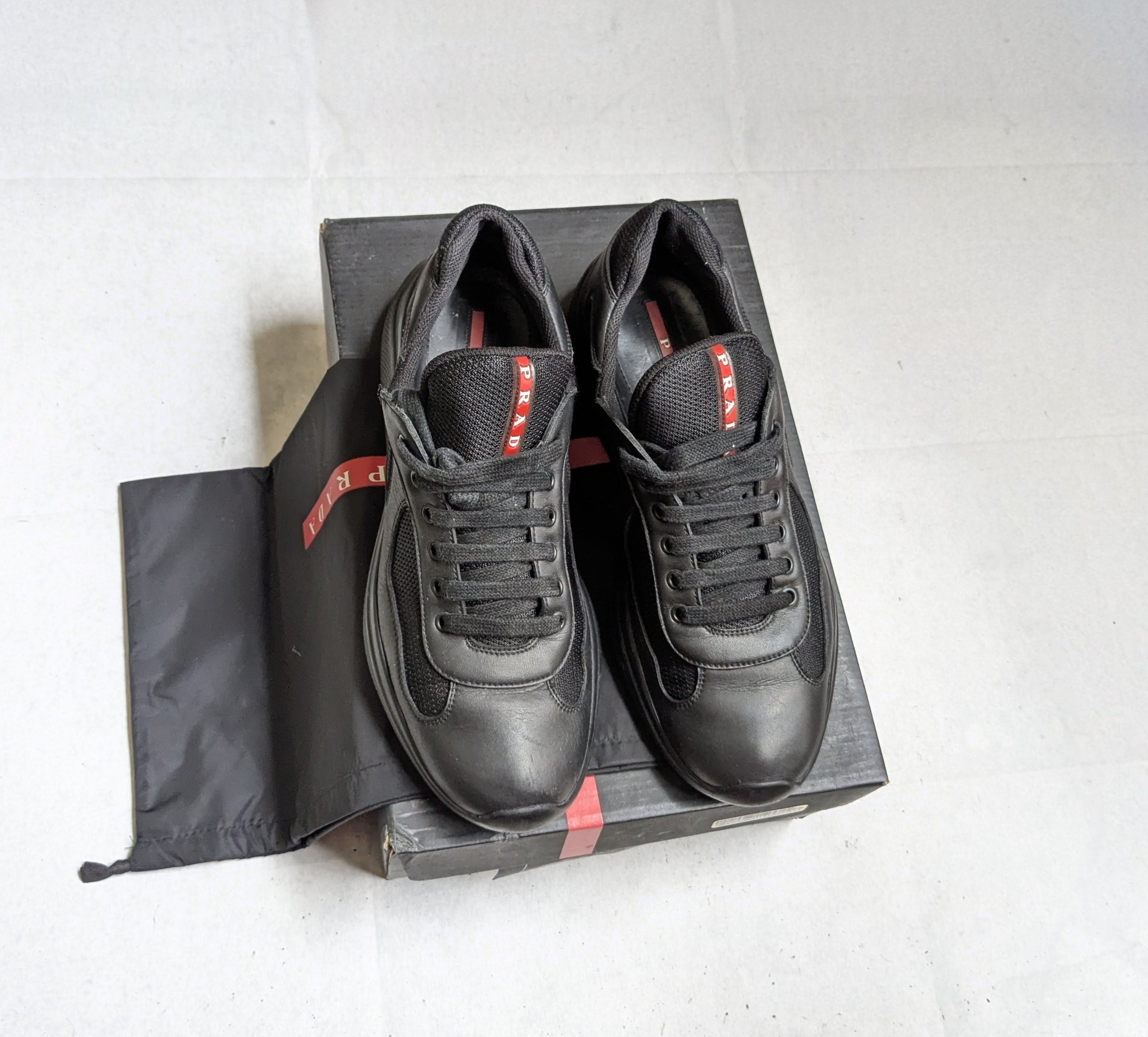 Prada Prada Cloudbust Sneakers black/red 20G 064 | Grailed