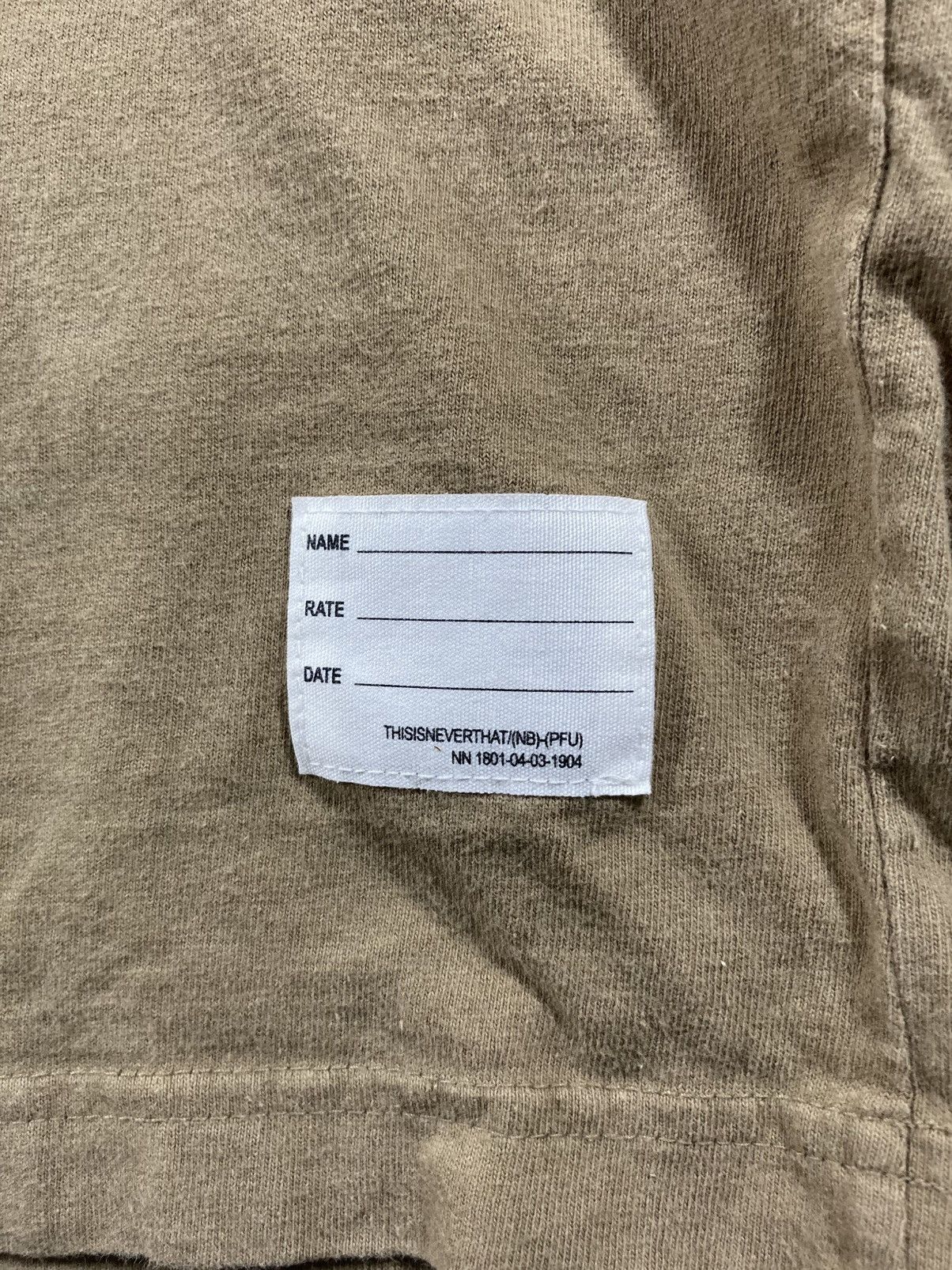 New Balance × thisisneverthat New Balance x thisisneverthat Physical Fitness Uniform (PFU) Size US XL / EU 56 / 4 - 7 Thumbnail