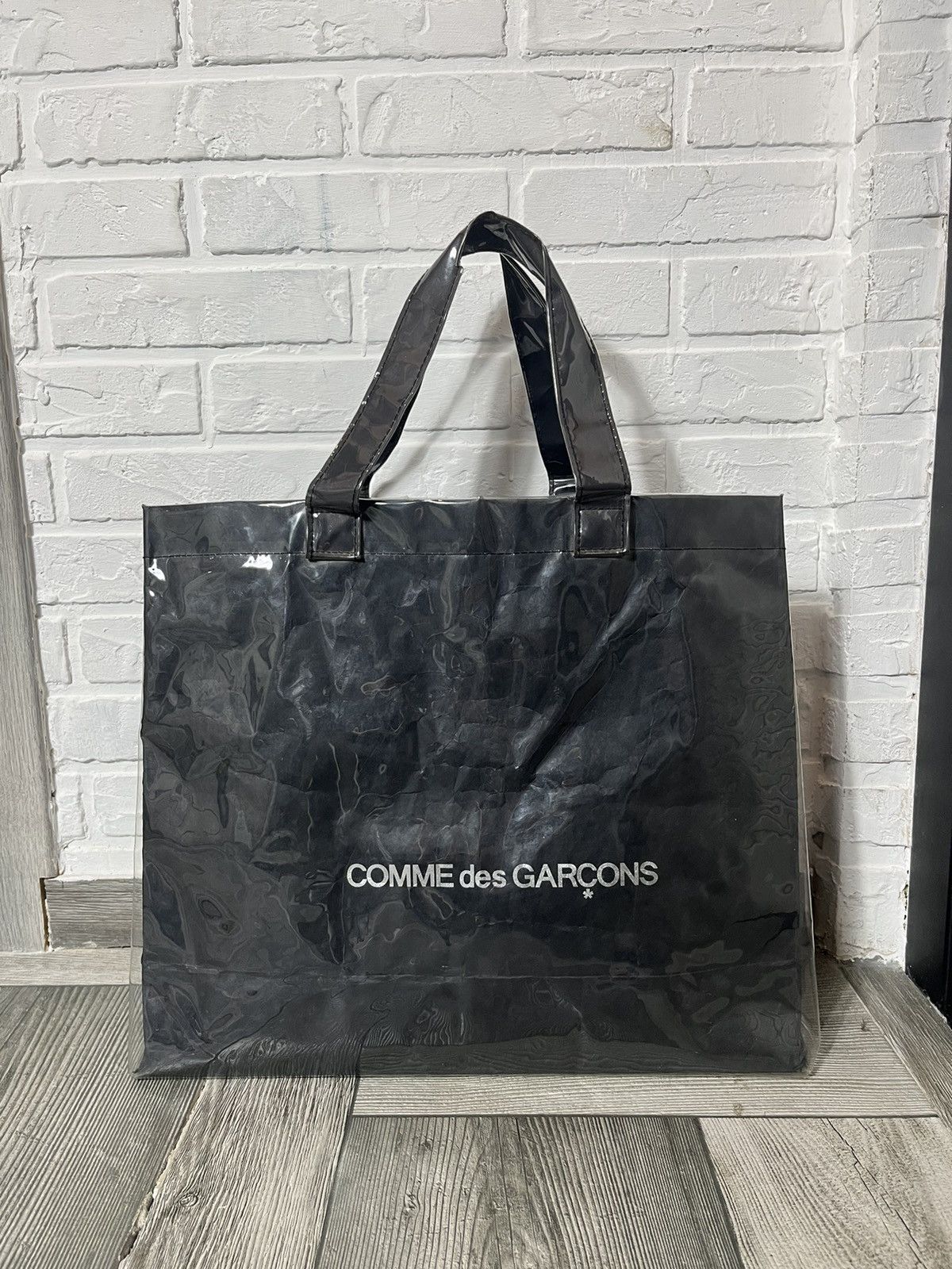 Comme Des Garcons - CDG Breaking News Clear PVC Plastic Tote Bag – eluXive