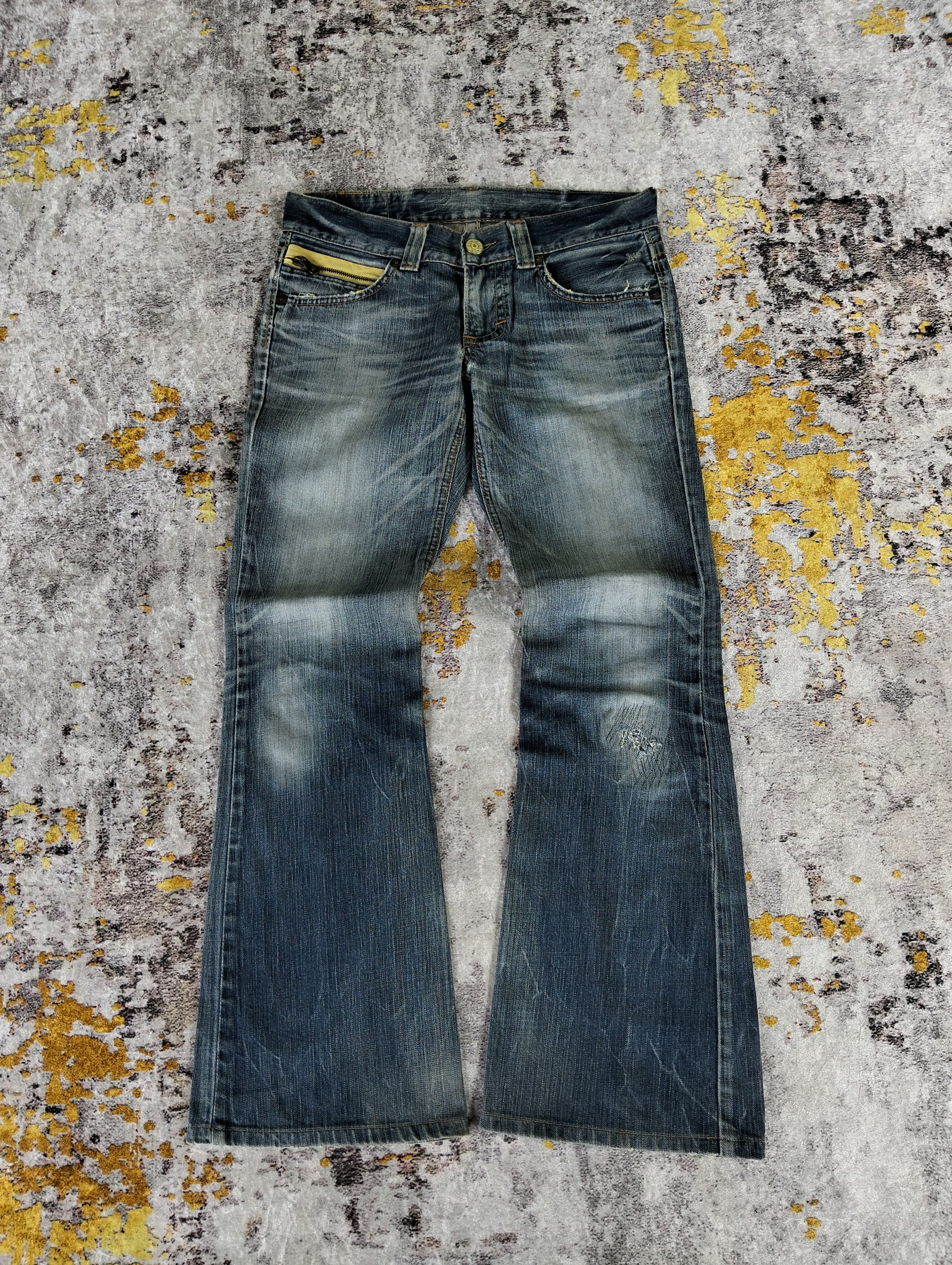 Edwin 503 Blue Trip Flared Spiral Low Rise Faded Jeans