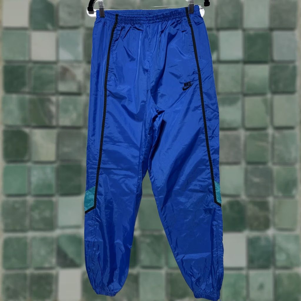 Nike VINTAGE Nike Track Pants Men L Blue Nylon Lightweight 80s Windbreaker Zip Pants Mens Size US 33 - 1 Thumbnail