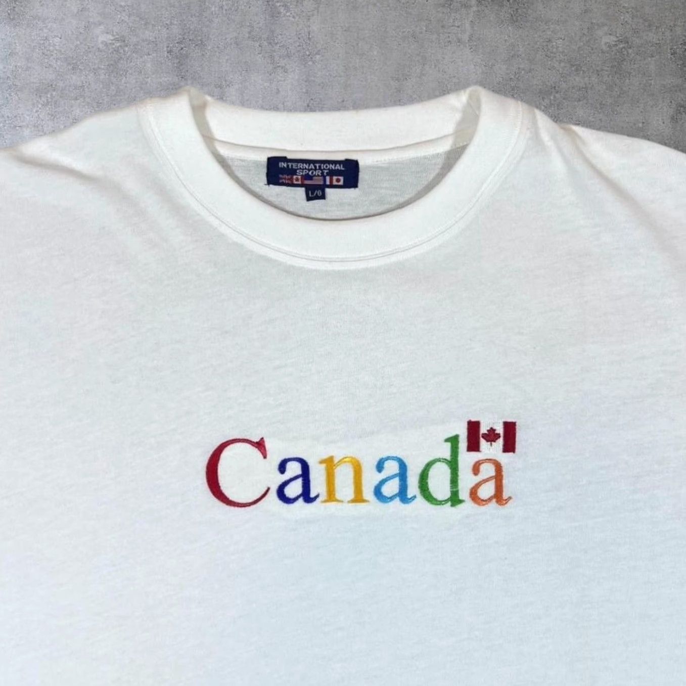 Vintage VINTAGE International Sport Canada Embroidered Rainbow White T-Shirt Large XL Men Casual Short Sleeve Crew Neck Cotton Rainbow Embroidered 1990s Mens Size US L / EU 52-54 / 3 - 3 Thumbnail