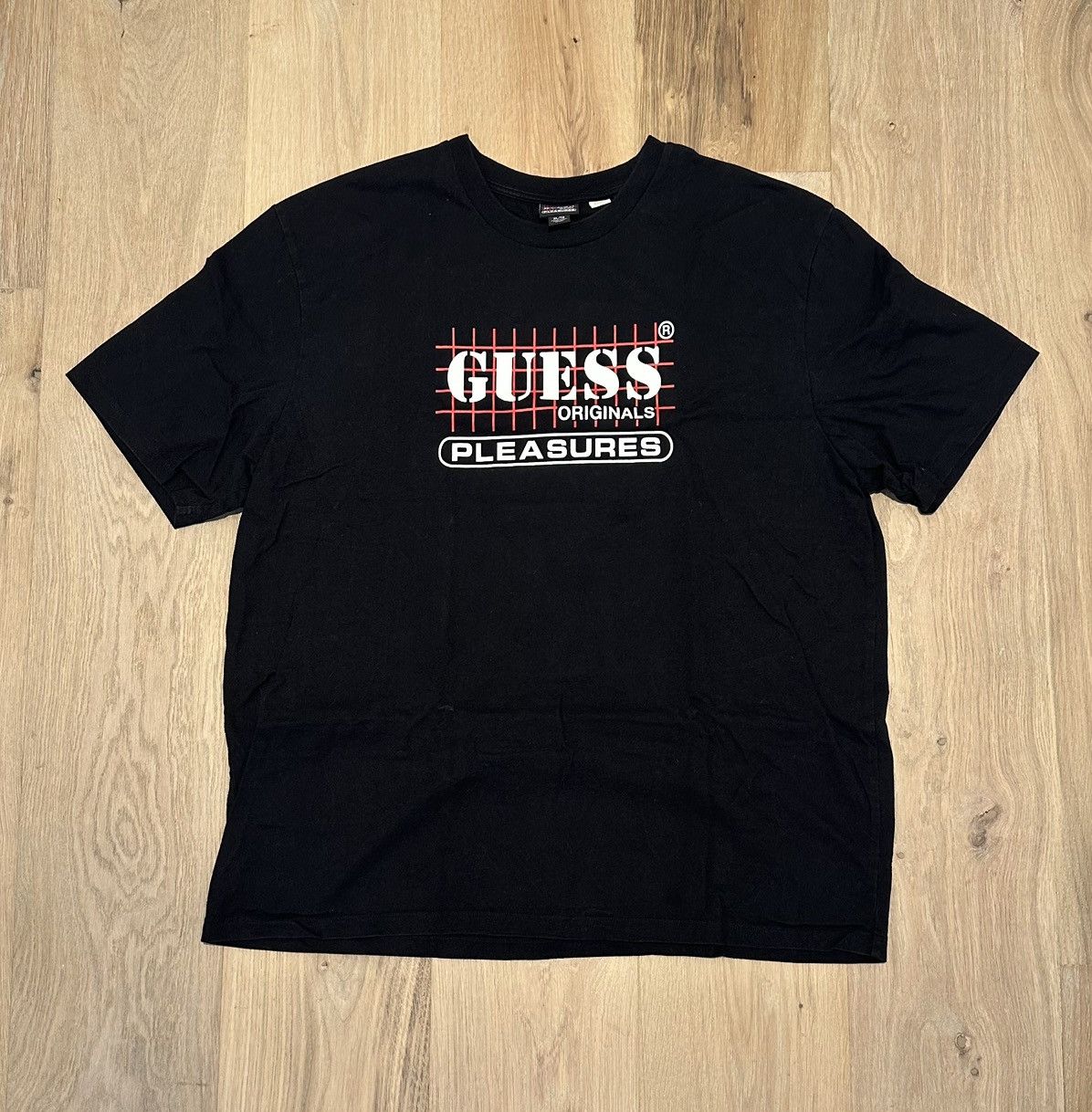 Guess × Pleasures Pleasures x Guess Collab Tee Size US XL / EU 56 / 4 - 1 Thumbnail