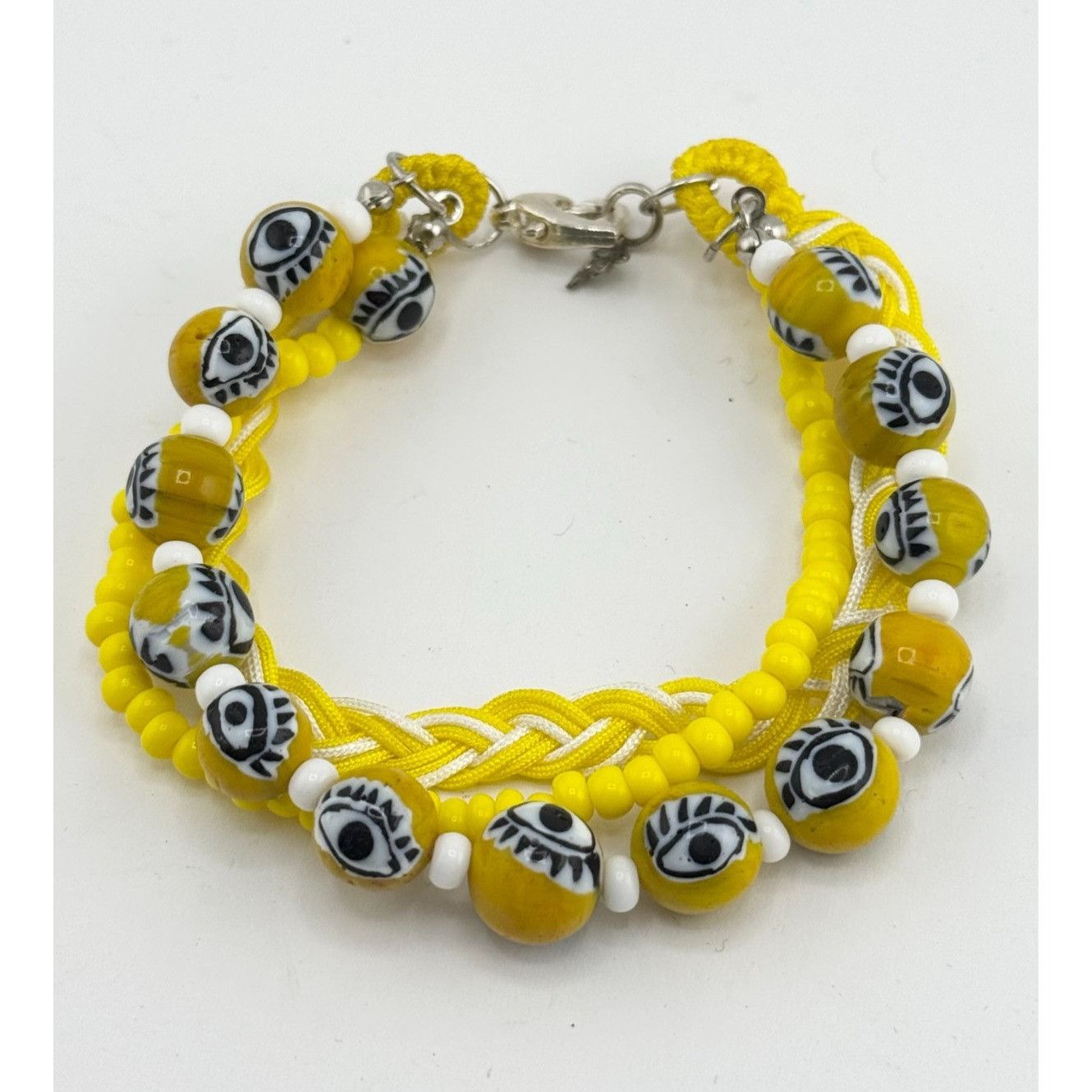 Vintage Vintage yellow glass evil eye beaded three strand braided br Size ONE SIZE - 1 Thumbnail
