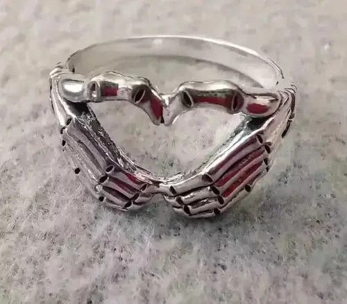 Jewelry Skull Hand With Heart-Shaped Ring Size ONE SIZE - 1 Thumbnail