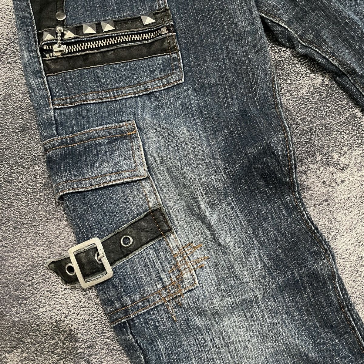 Flared Algonquins bondage punk studded denim pants