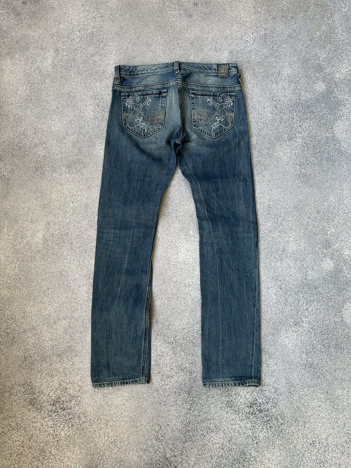 image of Vintage Diesel Dragons Denim Jeans in Blue, Men's (Size 29)