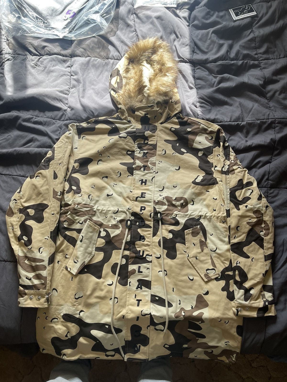 image of Fuck The Population Ftp Spell Out Fishtail Parka (Desert Camo), Men's (Size Large)