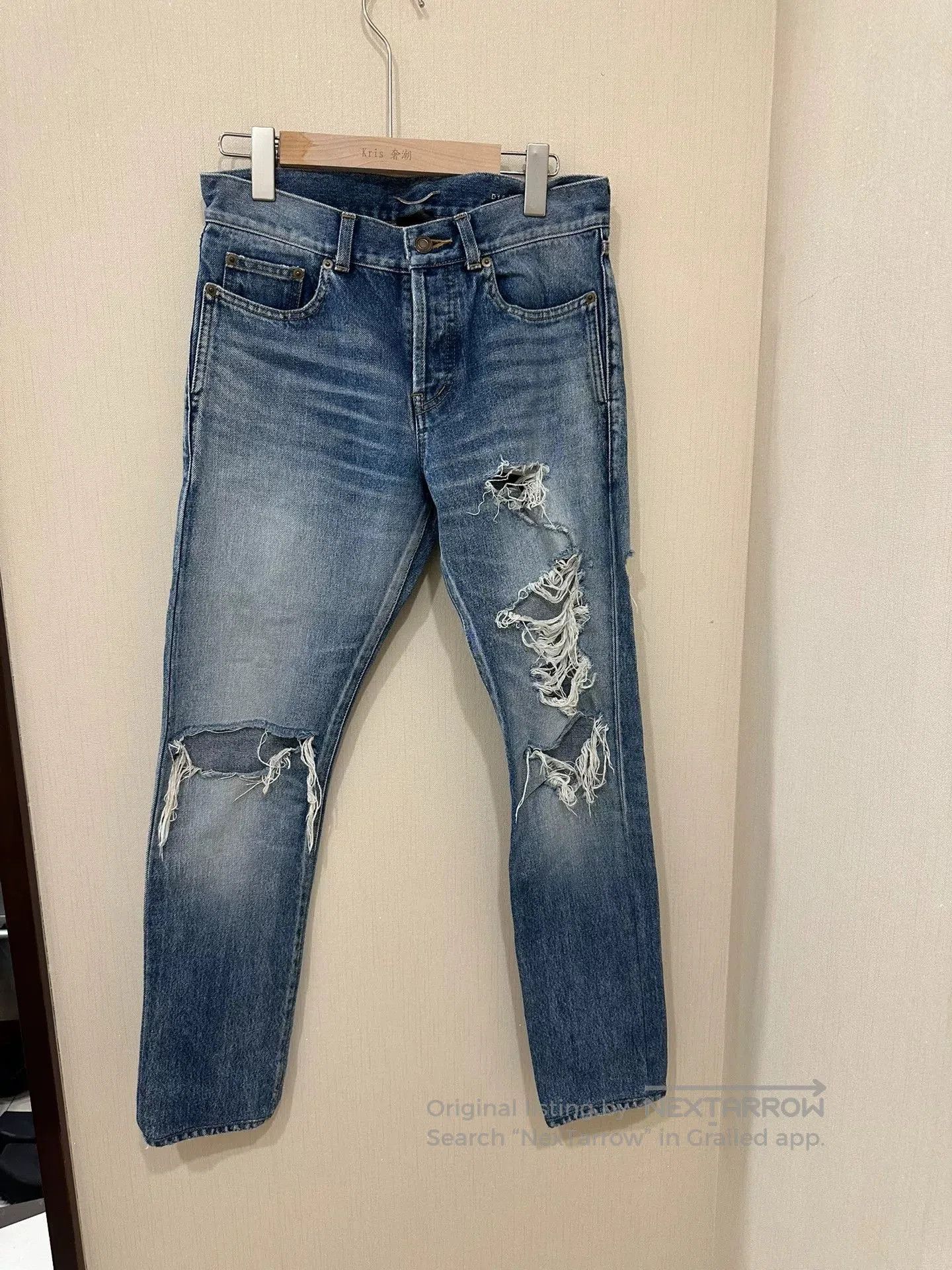 Saint Laurent Ripped Blue Denim Pants.