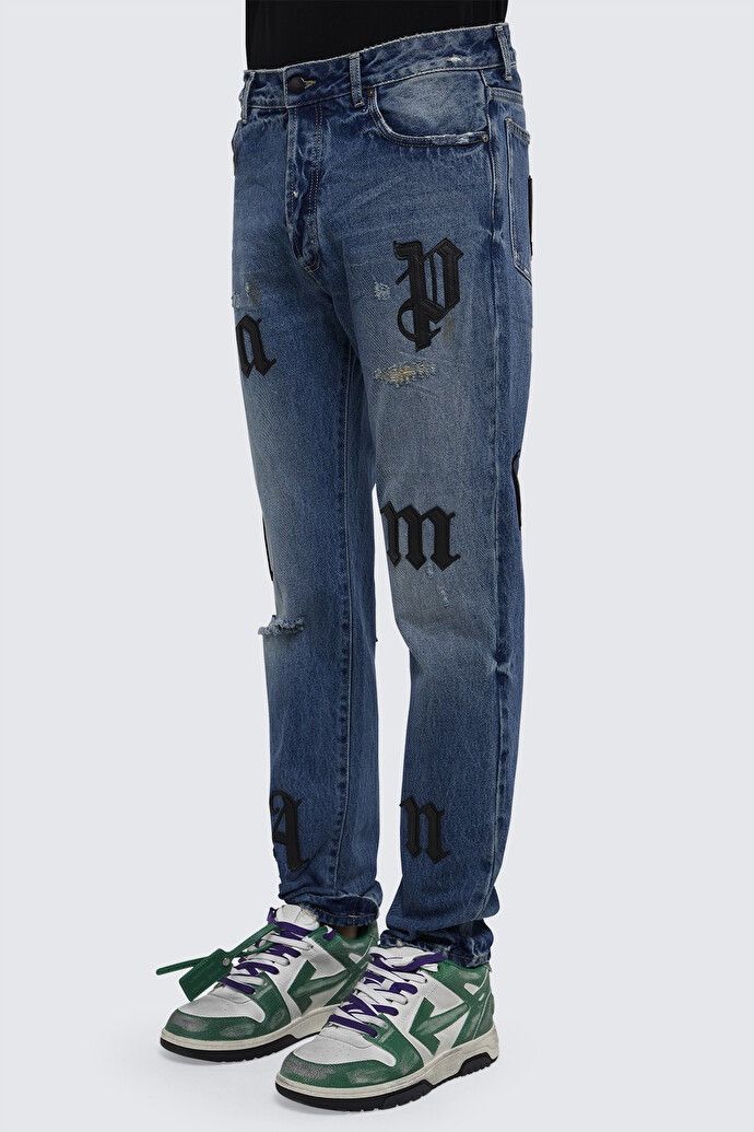 PALM ANGELS PATCH LOGO JEANS