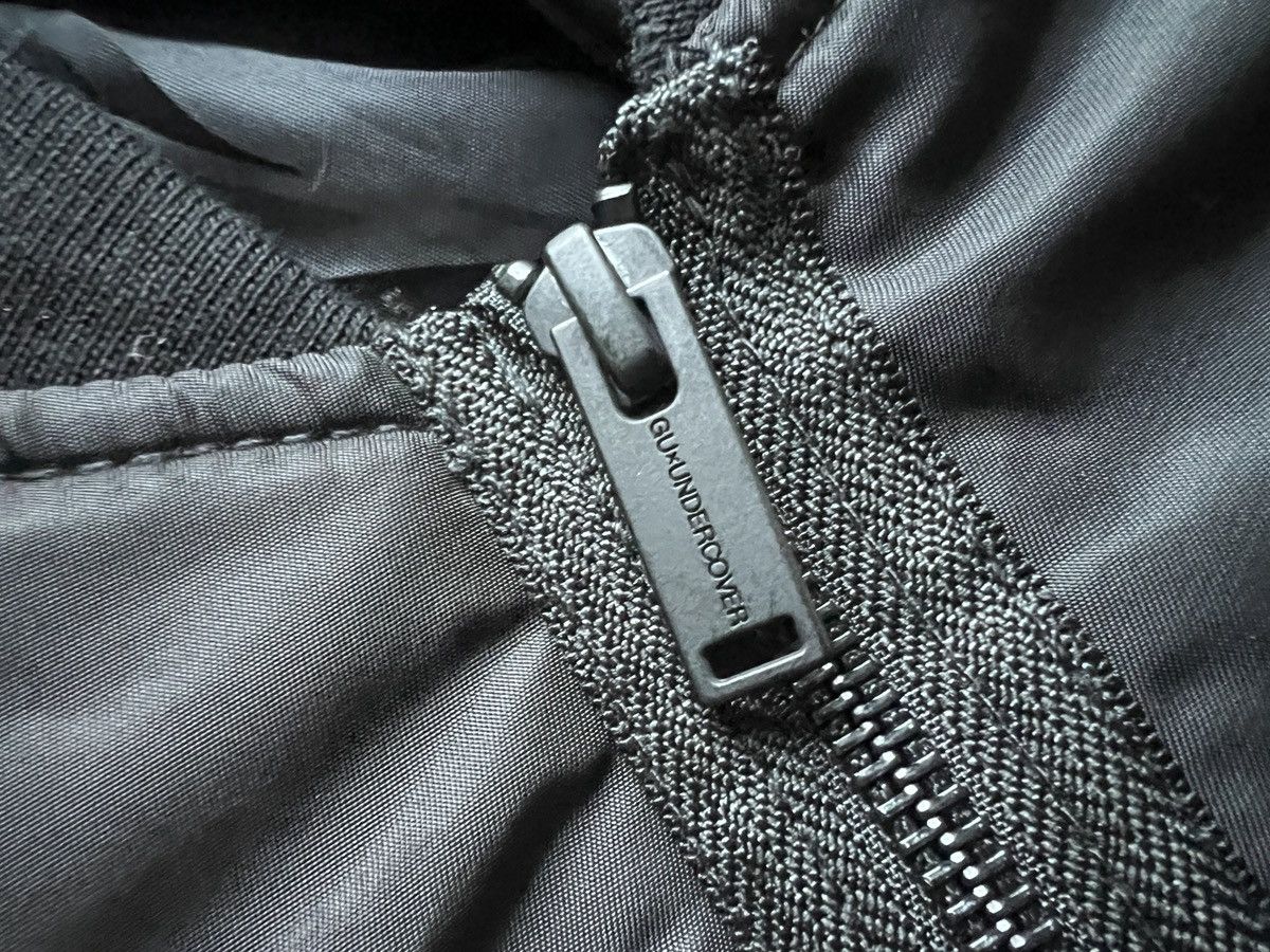 GU × Undercover Undercover x GU : Bomber Jacket Freedom Noise Size US M / EU 48-50 / 2 - 11 Thumbnail
