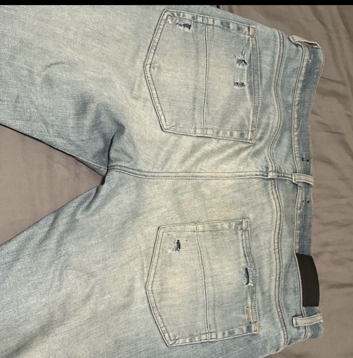 Amiri Cherub Jeans distressed light blue denim