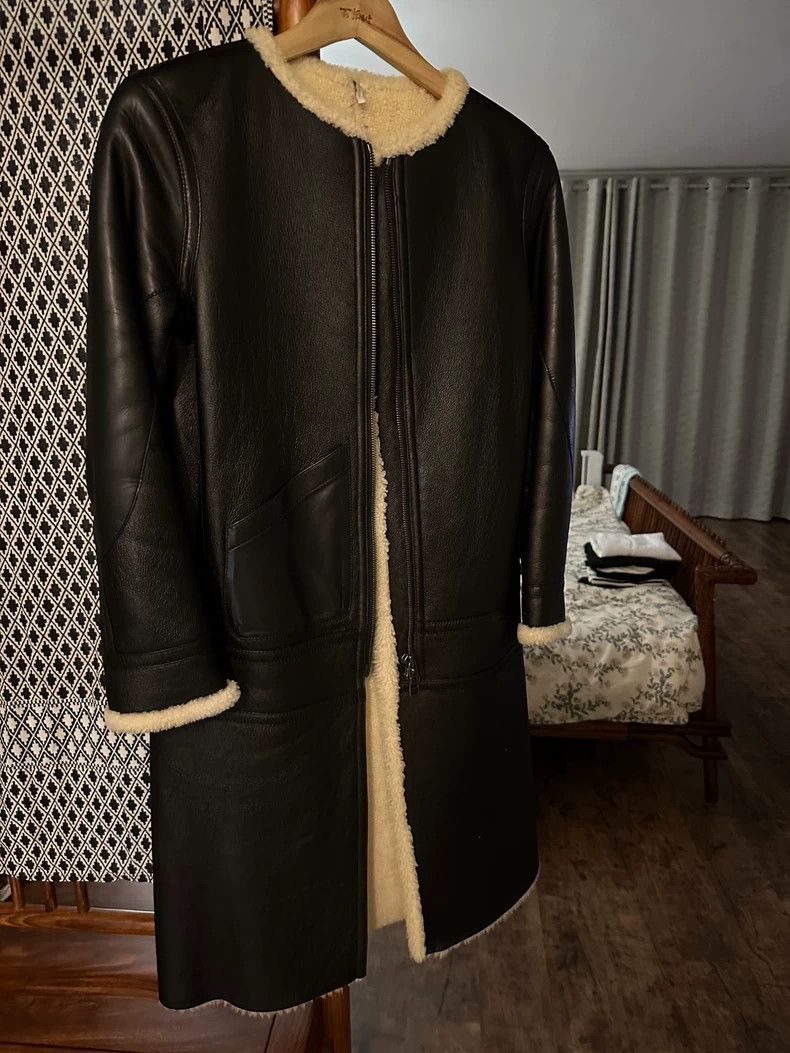 HELMUT LANG A long coat with sheepskin