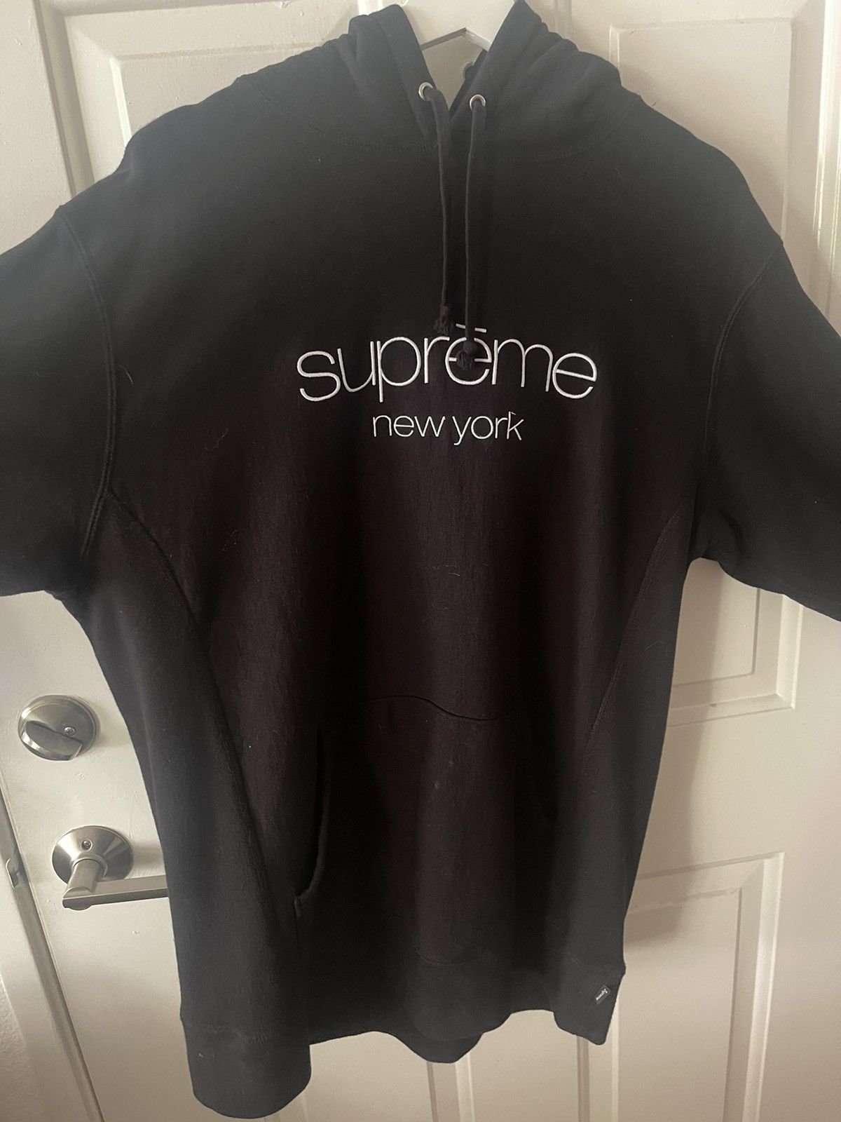 Supreme new york hoodie black hotsell