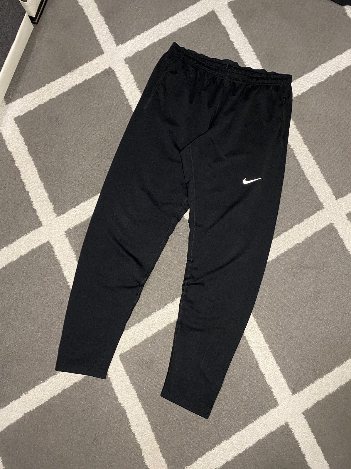 Nike Nocta Streetwear Nike Dri Fit men s sweatpants with reflective Swoosh Grailed