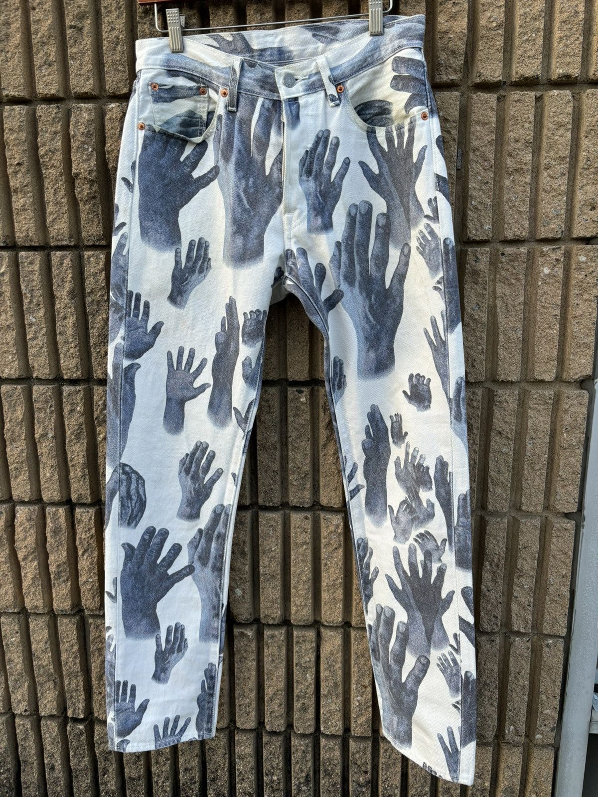 Denim Tears indigo hands white jeans