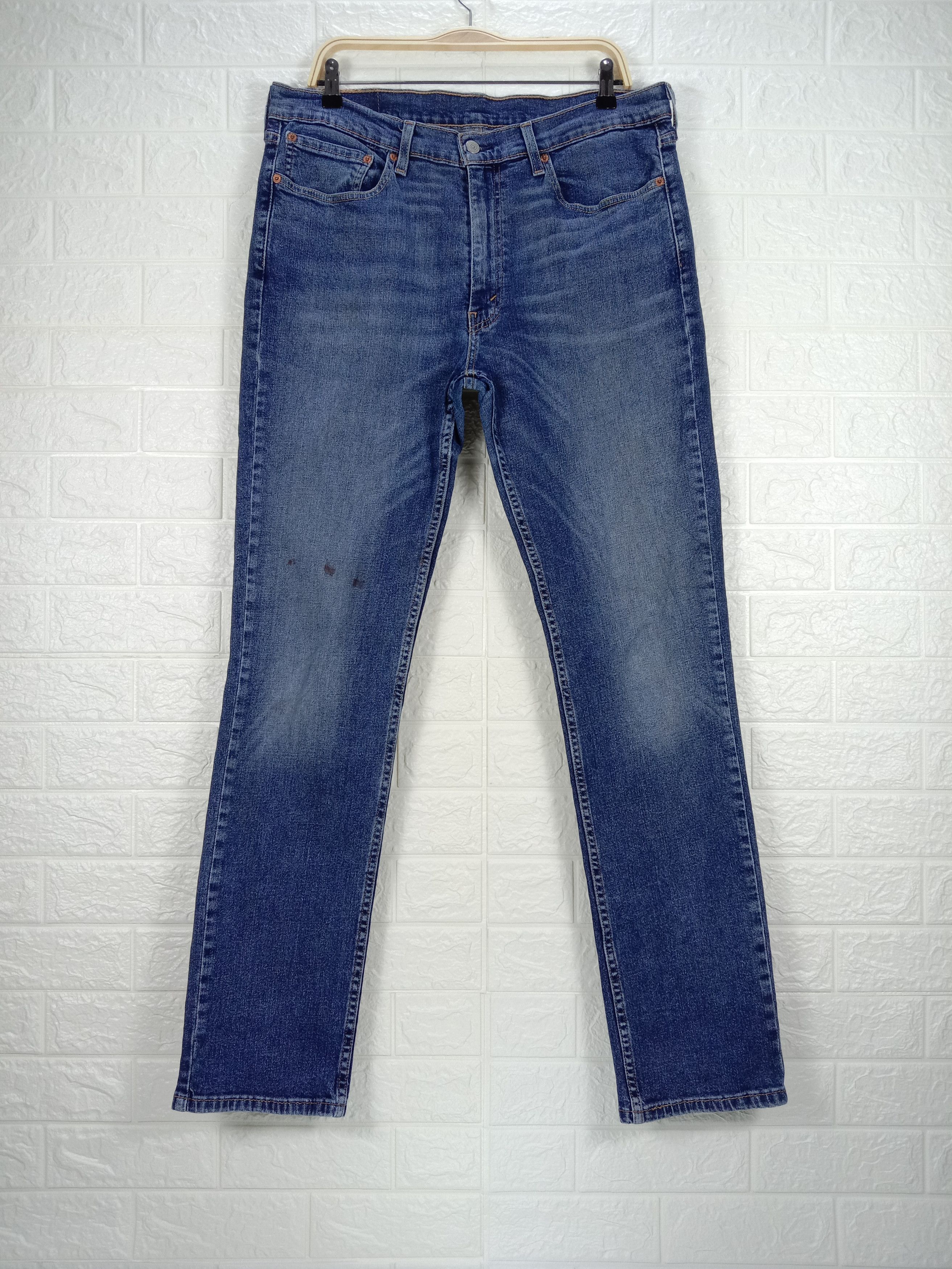 image of Vintage Levi's 514 Jeans Slim Straight Distressed Denim in Blue, Men's (Size 36)