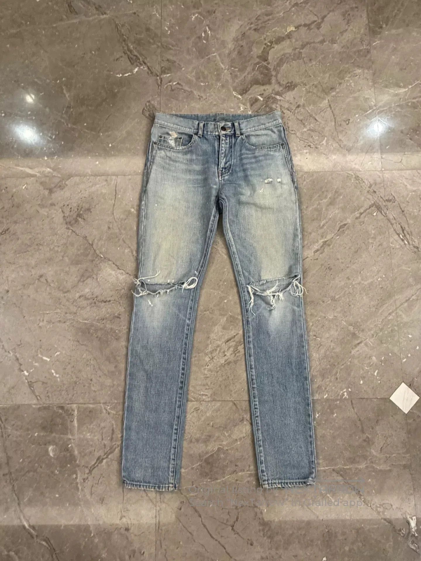 Saint Laurent Blue Distressed Denim Pants.