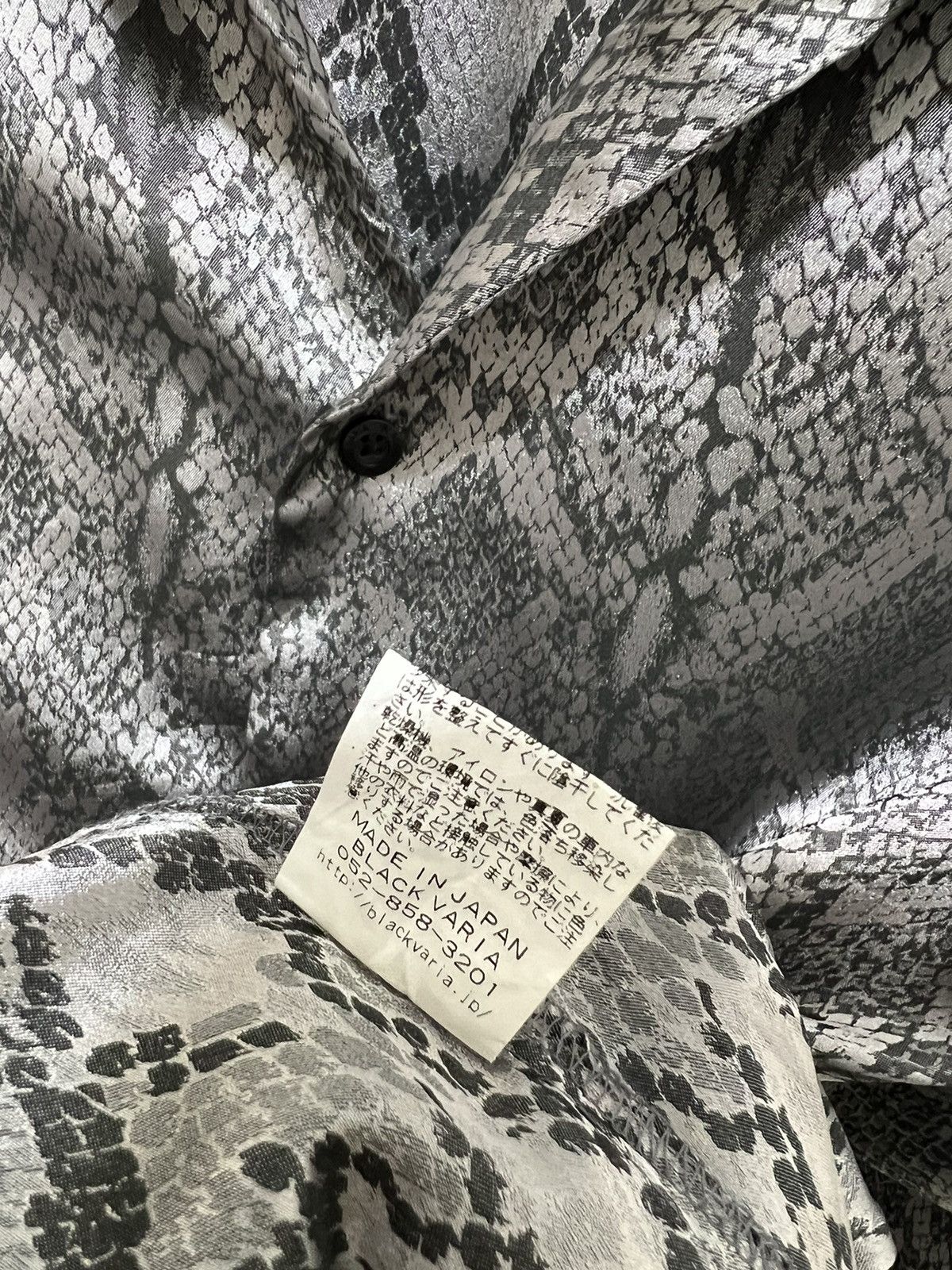 Black varia sateen phyton pattern button up shirt