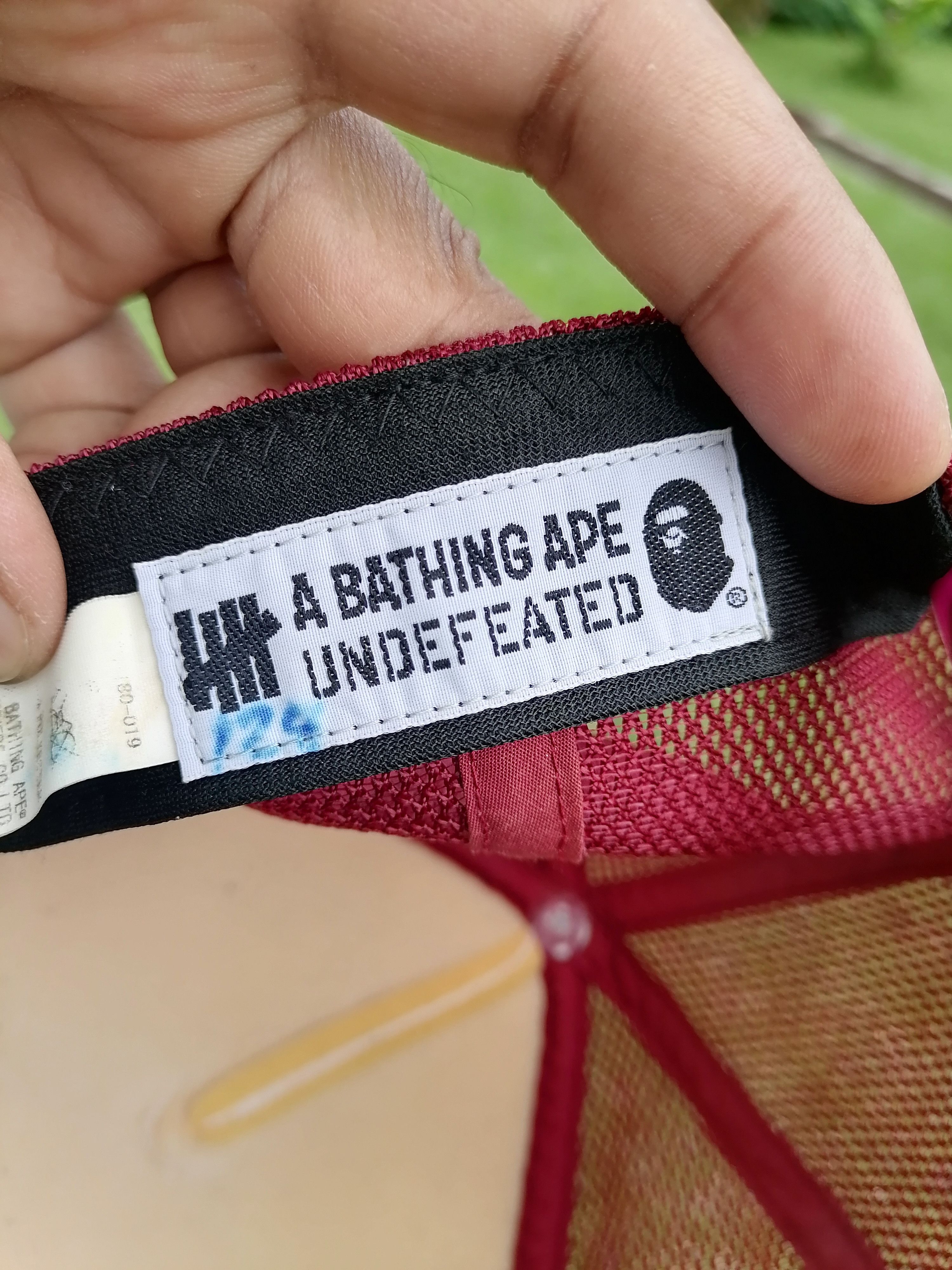 Bape × Undefeated A Bathing Ape x Undefeated Trucker Cap Size ONE SIZE - 7 Thumbnail