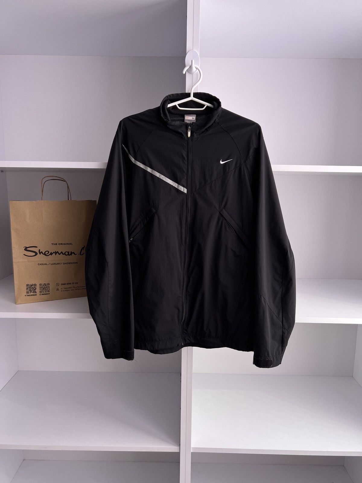 Vintage Nike Light 90s style windbreaker jacket