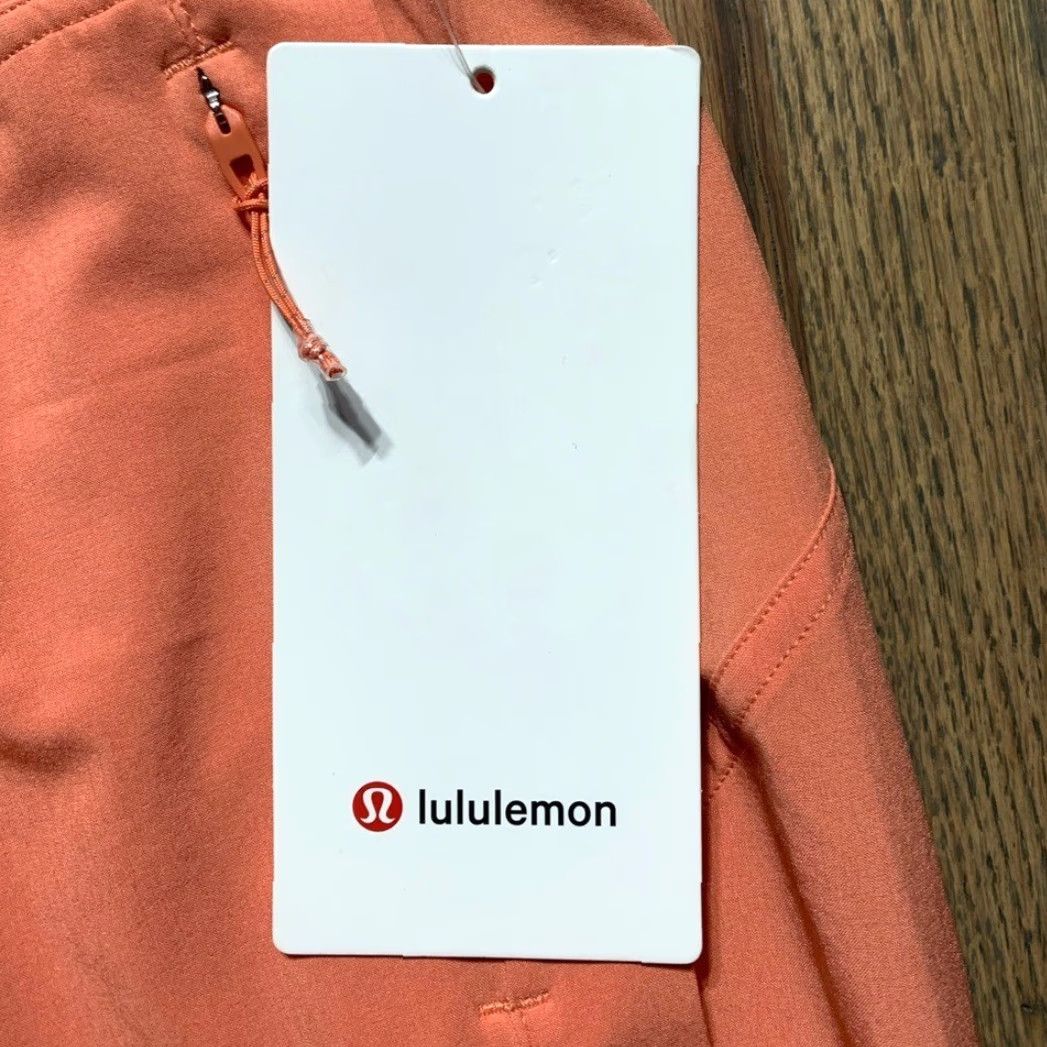 Lululemon NWT Lululemon tearaway mid-ride track pants Coral Kiss Women 4 Regular Orange Track Pants Women Size 27" / US 4 / IT 40 - 5 Thumbnail