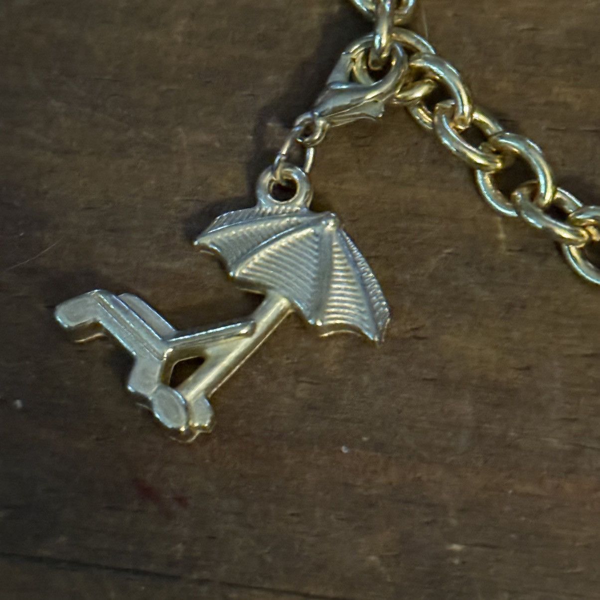 Other Diamond International gold tone Caribbean charm bracelet Size ONE SIZE - 4 Thumbnail