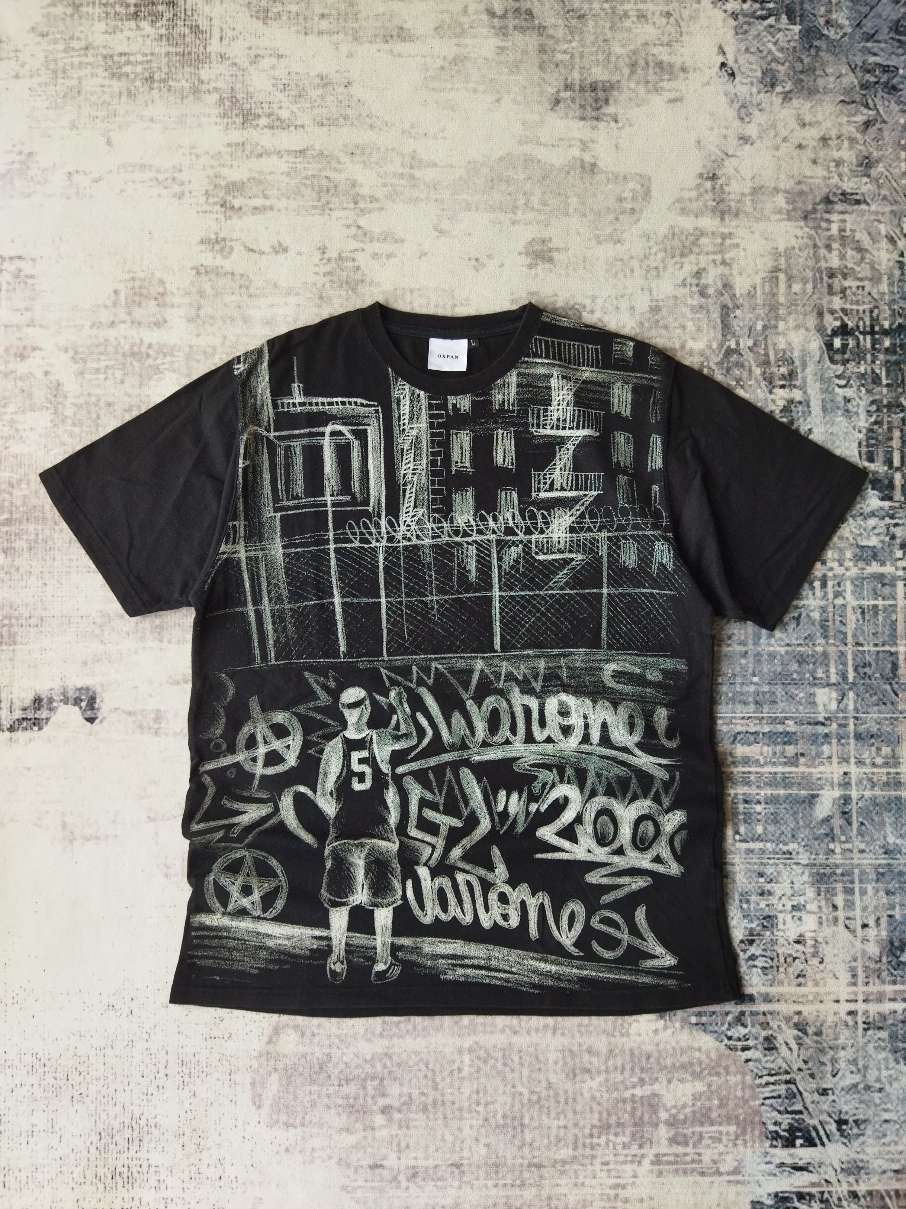 image of Vintage Oxfam Grafiti Print Design T-Shirt in Black, Men's (Size Large)