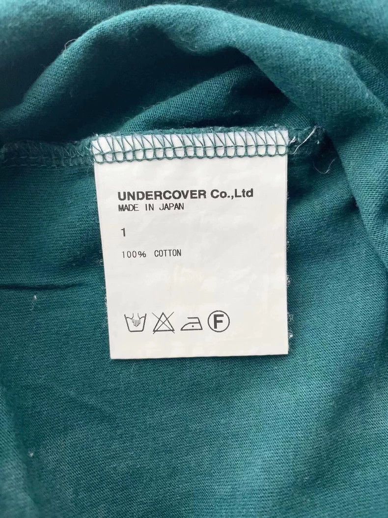 Undercover Undercover 2007 SS PURPLE Angel T-Shirt | Grailed