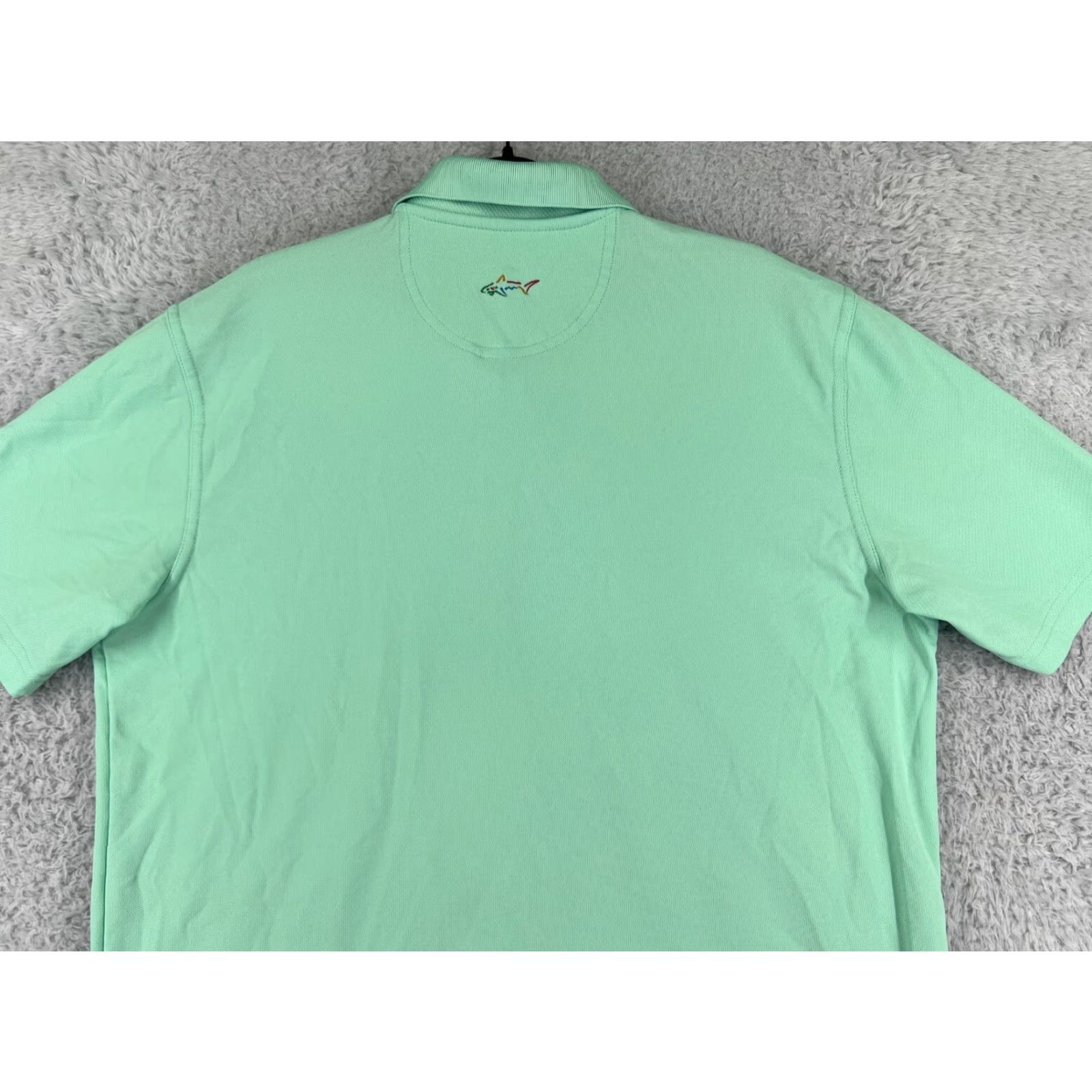 Vintage Greg Norman Polo Shirt Men Large Green Golf Polo Shirt Mens Regular Green Greg Norman Play Dry Shark Golf Short Sleeve Polyester Polo Shirt Size US L / EU 52-54 / 3 - 7 Thumbnail