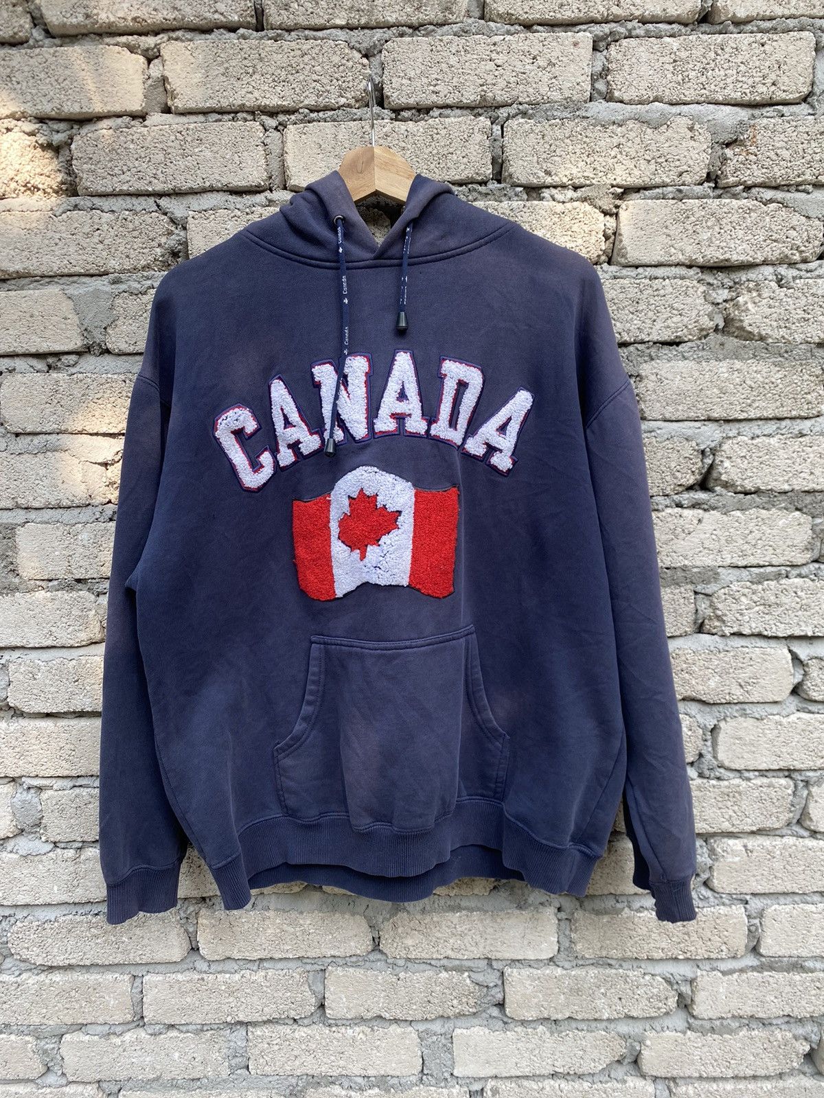 image of Canada Big Logo Hoodie Sweatshirt Distressed in Navy Blue, Men's (Size Large)