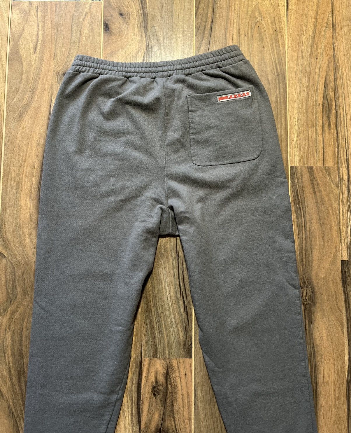 Prada Prada red tap pants joggers sweat Size US 30 / EU 46 - 4 Thumbnail