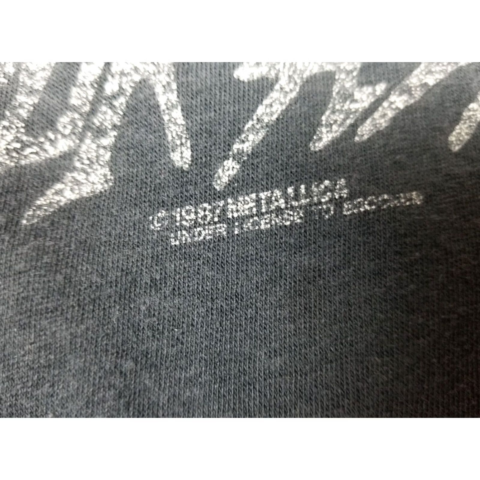 Vintage VINTAGE 87' METALLICA HEAVY METAL ROCK BAND TOUR T-SHIRT SZ MEDIUM Mens T-Shirt Black Cotton Logo Short Sleeve Round Neck 27 inch Back 19 inch 19 27 Size US M / EU 48-50 / 2 - 3 Thumbnail