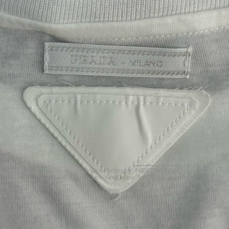 Prada Prada White cloth triangle label solid colour short sleeve Size US M / EU 48-50 / 2 - 8 Thumbnail