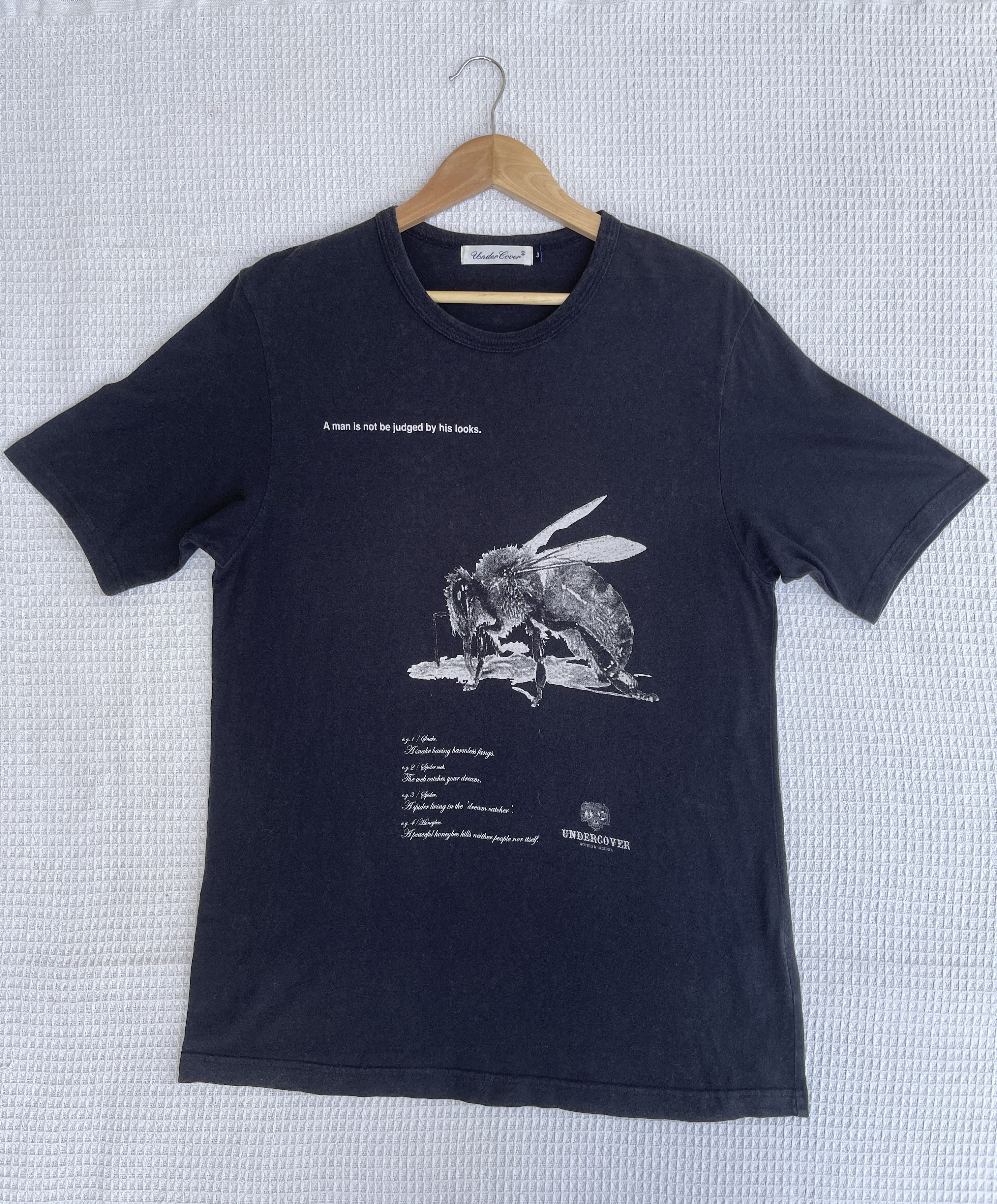 Japanese Brand LastDrop🔥Undercover “A Man is not be judged by his looks”Tee Size US M / EU 48-50 / 2 - 8 Thumbnail