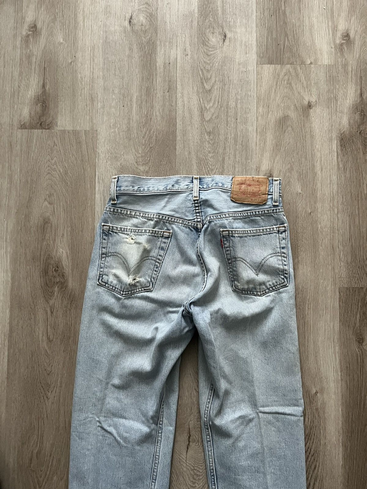 image of Levis x Levis Vintage Clothing Vintage Levi’S 505 Light Wash Distressed Denim Jeans in Blue (Size 3